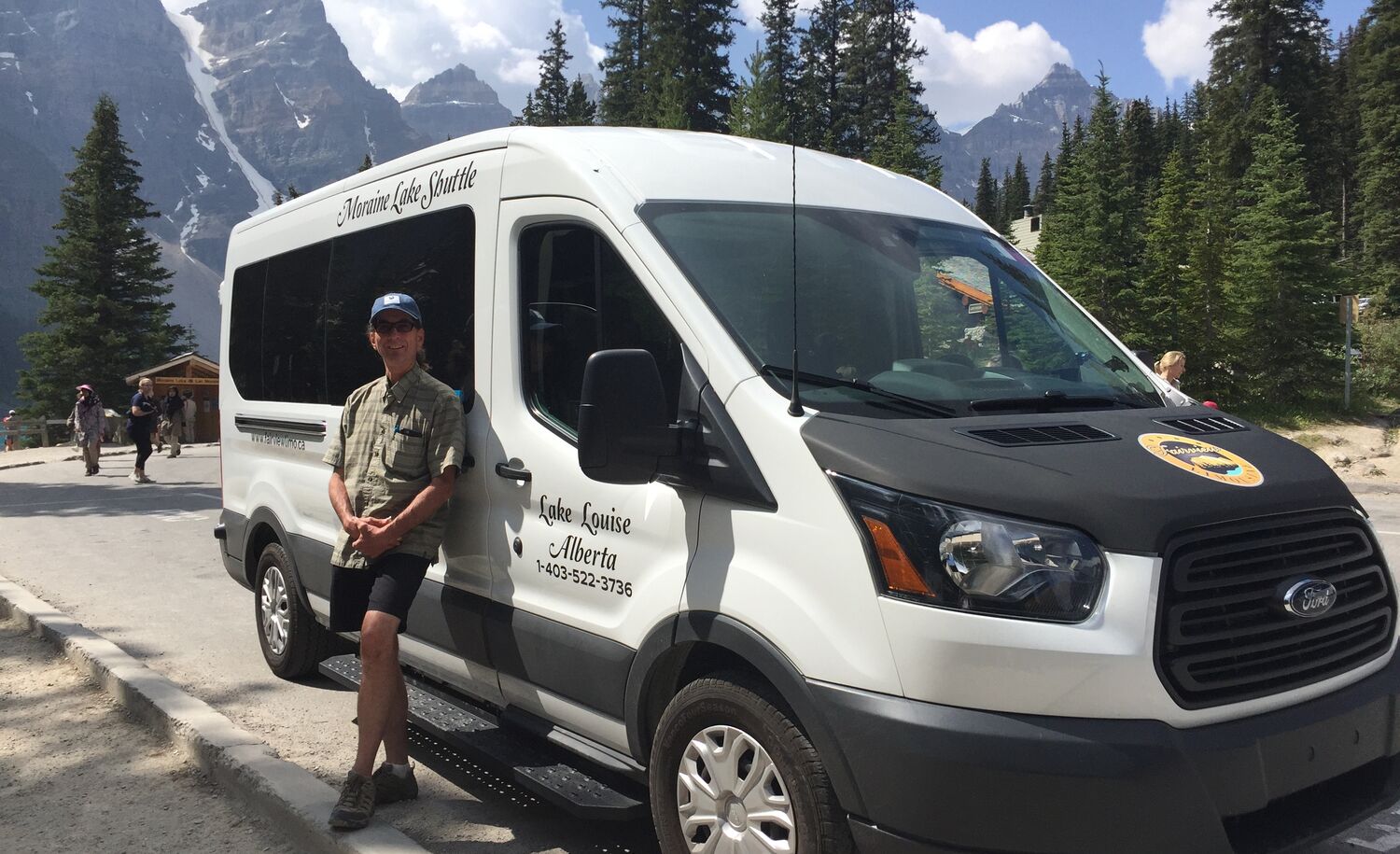 The Fairview Limo bus at the parking lot for the Valley of the Ten Peaks.